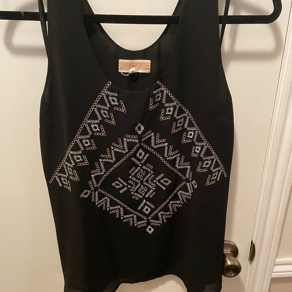 Tribal top by last April